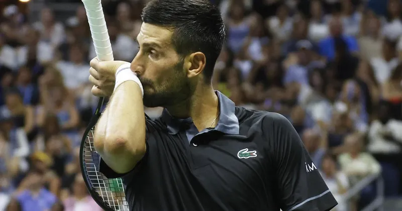 Novak Đoković zaradi zdravstvenih težav izpadel v prvem krogu OP ZDA proti Navoneju