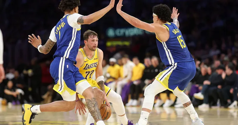 Luka Dončić z 28 točkami in košem s sredine do zmage Dallasa nad Warriors